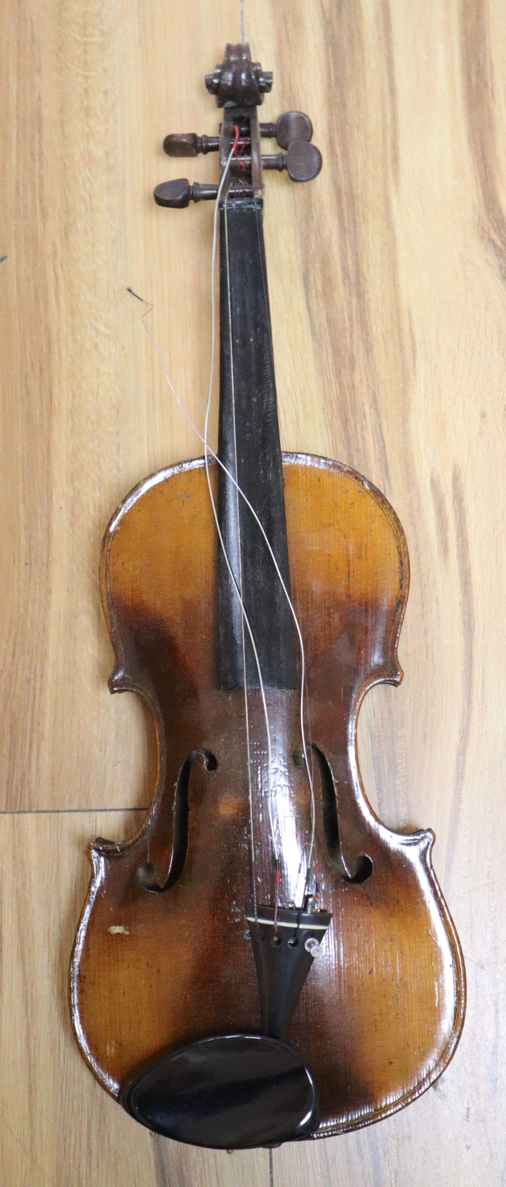 A violin labelled W Placht & Co, 58cm, cased